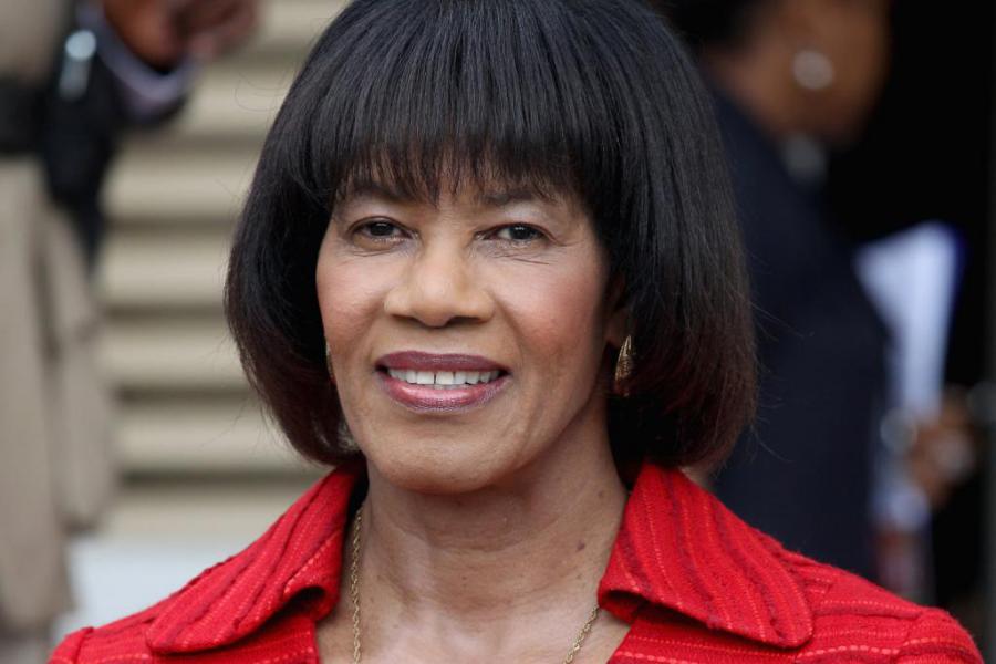 Former Prime Minister of Jamaica with Cuba and against the blockade on the 62nd Anniversary of the Revolution.