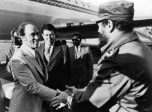 © (CP PHOTO/HO) Cuban President Fidel Castro holds baby Michel as Pierre and Margaret Trudeau look on during their state visit to Cuba in this Jan., 1976 photo.