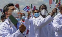 Cuba al servicio de los pueblos, con honor y placer