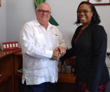 Minister of Dominica receives Ambassador of Cuba.