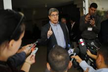 AP: FILE - In this Dec. 12, 2018, file photo, Cuba's Director-General of U.S. Affairs Carlos Fernandez de Cossio makes a statement to reporters, in Havana, Cuba. De Cossio says his nation has no troops in Venezuela but it maintains the right to military and intelligence cooperation with its ally. (AP Photo/Desmond Boylan, File)