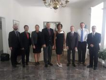 The work agenda included a meeting with the Honourable Governor of that British overseas territory, H.E Mr. Martyn Roper, OBE, and was also attended by the Honourable Deputy Governor, Mr. Franz Manderson, MBE, CERT.HON, JP, and other senior dignitaries of the Cayman Islands Government.