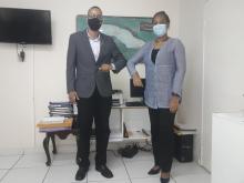 Cuban Ambassador meets with Jamaican doctor and philanthropist Dr. Romario Simpson.