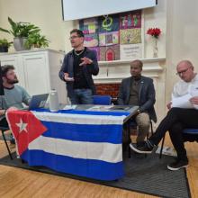Voces por solidaridad en la reunión "¡Contra la guerra de Trump contra Cuba!" en la ciudad de Brighton.